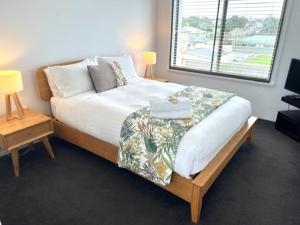 
A bed or beds in a room at Vista Marina Penthouse #5
