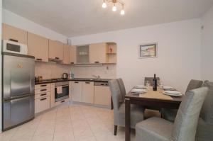 Kuchyň nebo kuchyňský kout v ubytování Apartment Irena