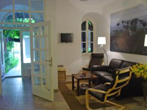 a living room with a couch and a table at Apartment Mimosa in Kotor