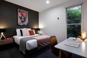 Ліжко або ліжка в номері Vue Lake Daylesford Villa