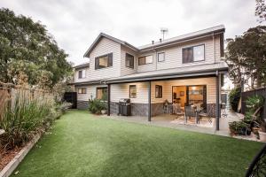 an image of a house with a yard at Starboard Drift in Margaret River Town