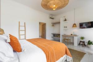 Postel nebo postele na pokoji v ubytování Jepun Sari Uluwatu