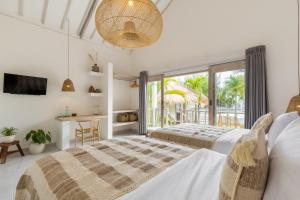 Postel nebo postele na pokoji v ubytování Jepun Sari Uluwatu + 37 fotografií