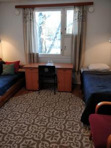 Tempat tidur dalam kamar di Gasthaus Henri
