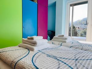 Katil atau katil-katil dalam bilik di Relax sul Lago Maggiore