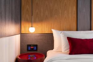 Postel nebo postele na pokoji v ubytování Ramada Plaza by Wyndham Bangkok Sukhumvit 48 + 56 fotografií