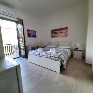 Postel nebo postele na pokoji v ubytování B&B La Carminella + 24 fotografií