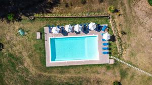 an aerial view of a resort with a swimming pool at Agriturismo Villalugnano in Lugnano