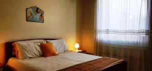 Letto o letti in una camera di Via Ugento Apartments - a pochi passi dalle spiagge