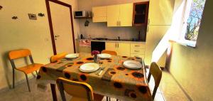Cucina o angolo cottura di Via Ugento Apartments - a pochi passi dalle spiagge