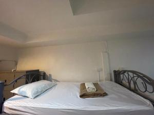 Uma cama ou camas num quarto em Phi Phi Paradise Hostel