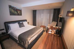 Cama ou camas em um quarto em Brezovica Hotel & SPA