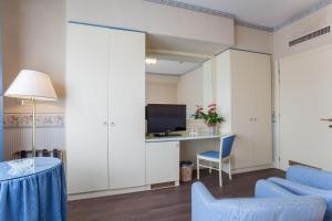 TV a/nebo společenská místnost v ubytování Hotel Bristol Buja