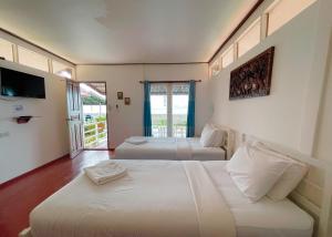 Postel nebo postele na pokoji v ubytování Holiday Resort - SHA Plus
