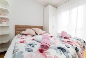 Postel nebo postele na pokoji v ubytování GOLDEN HOPE 4+1 APARTMENT KRK