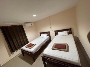 Uma cama ou camas num quarto em Phi Phi Paradise Hostel