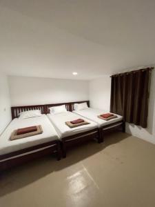 Uma cama ou camas num quarto em Phi Phi Paradise Hostel