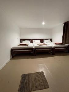 Uma cama ou camas num quarto em Phi Phi Paradise Hostel