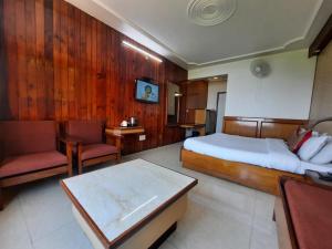 TV a/nebo společenská místnost v ubytování Hotel Vishnu Palace