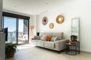 Posedenie v ubytovaní Apartamento nuevo junto al mar con plaza de garaje!! Perfecto para familias