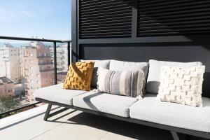 Posedenie v ubytovaní Apartamento nuevo junto al mar con plaza de garaje!! Perfecto para familias