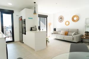 Posedenie v ubytovaní Apartamento nuevo junto al mar con plaza de garaje!! Perfecto para familias