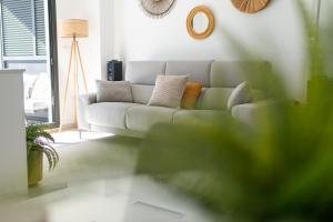 Posedenie v ubytovaní Apartamento nuevo junto al mar con plaza de garaje!! Perfecto para familias