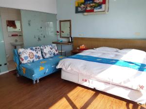 Vuode tai vuoteita majoituspaikassa 永旺旅店 Yong Wong Hostel
