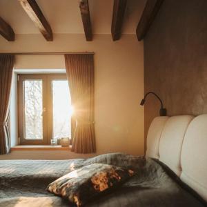 Ein Bett oder Betten in einem Zimmer der Unterkunft Asten-Chalets