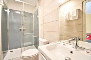 Koupelna v ubytování Hotel Fortin + 29 fotografií