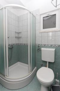 Koupelna v ubytování Apartments Posta