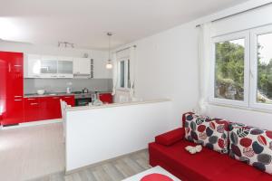 Kuchyň nebo kuchyňský kout v ubytování Apartments Posta + 37 fotografií