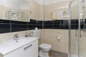 Koupelna v ubytování Apartments Posta