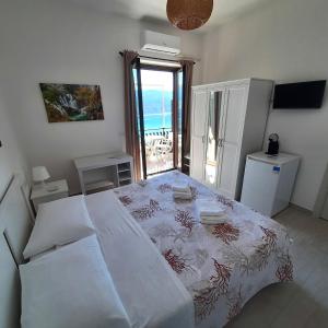 Postel nebo postele na pokoji v ubytování B&B La Carminella