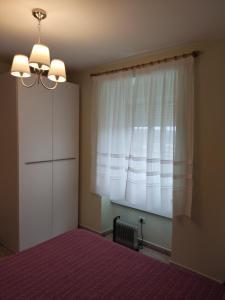Кровать или кровати в номере OS MUIÑOS