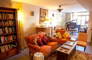 a living room with a couch and a table at Maison Bellachonne in Bellac