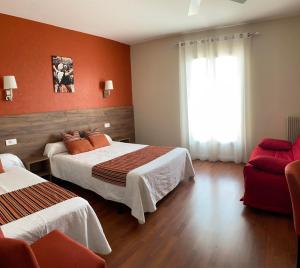 Postel nebo postele na pokoji v ubytování Hôtel Le Belvedere