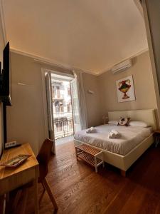 Posteľ alebo postele v izbe v ubytovaní B&B TIVÌTTI