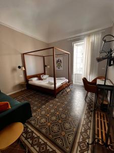 Postel nebo postele na pokoji v ubytování B&B TIVÌTTI