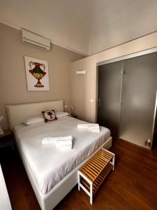 Postel nebo postele na pokoji v ubytování B&B TIVÌTTI