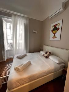 Posteľ alebo postele v izbe v ubytovaní B&B TIVÌTTI + 21 fotografií