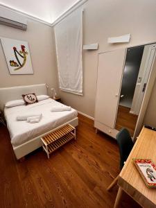 Postel nebo postele na pokoji v ubytování B&B TIVÌTTI