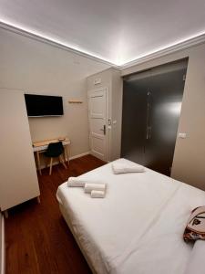 Postel nebo postele na pokoji v ubytování B&B TIVÌTTI