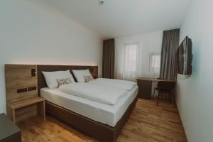 Burghotel Schlaining客房内的一张或多张床位