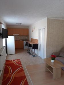 Kuchyňa alebo kuchynka v ubytovaní Joe Beach Apartman