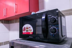 Cuina o zona de cuina de Easyinn Shortlet Apartment