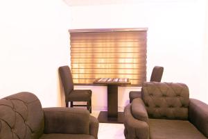 Zona d'estar a Easyinn Shortlet Apartment