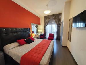 Postel nebo postele na pokoji v ubytování Hotel Continentale