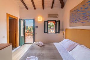 Cama ou camas em um quarto em Hotel Villino Gallodoro
