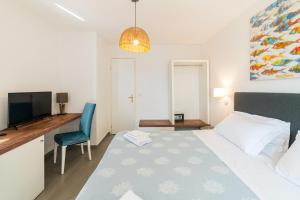 Cama ou camas em um quarto em Hotel Villino Gallodoro